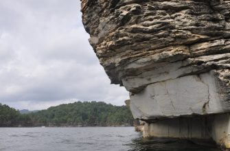 Climbing above the clear water of Summersville Lake, West Virginia